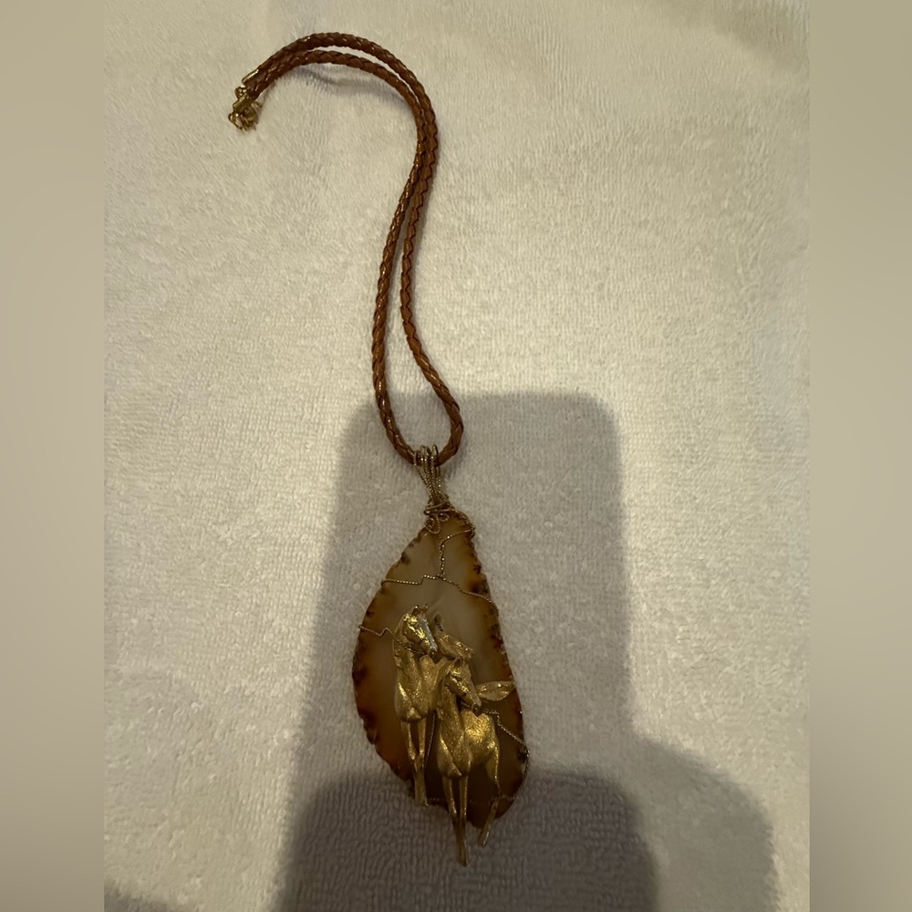 Stone and gold tone pendant necklace